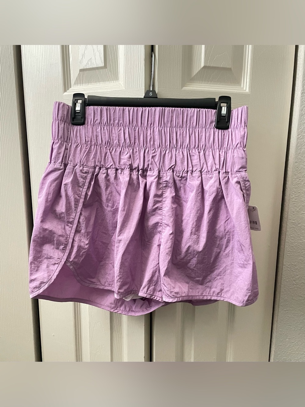 FP Movement Smocked-Waist Athletic Shorts in color Bubble Tea